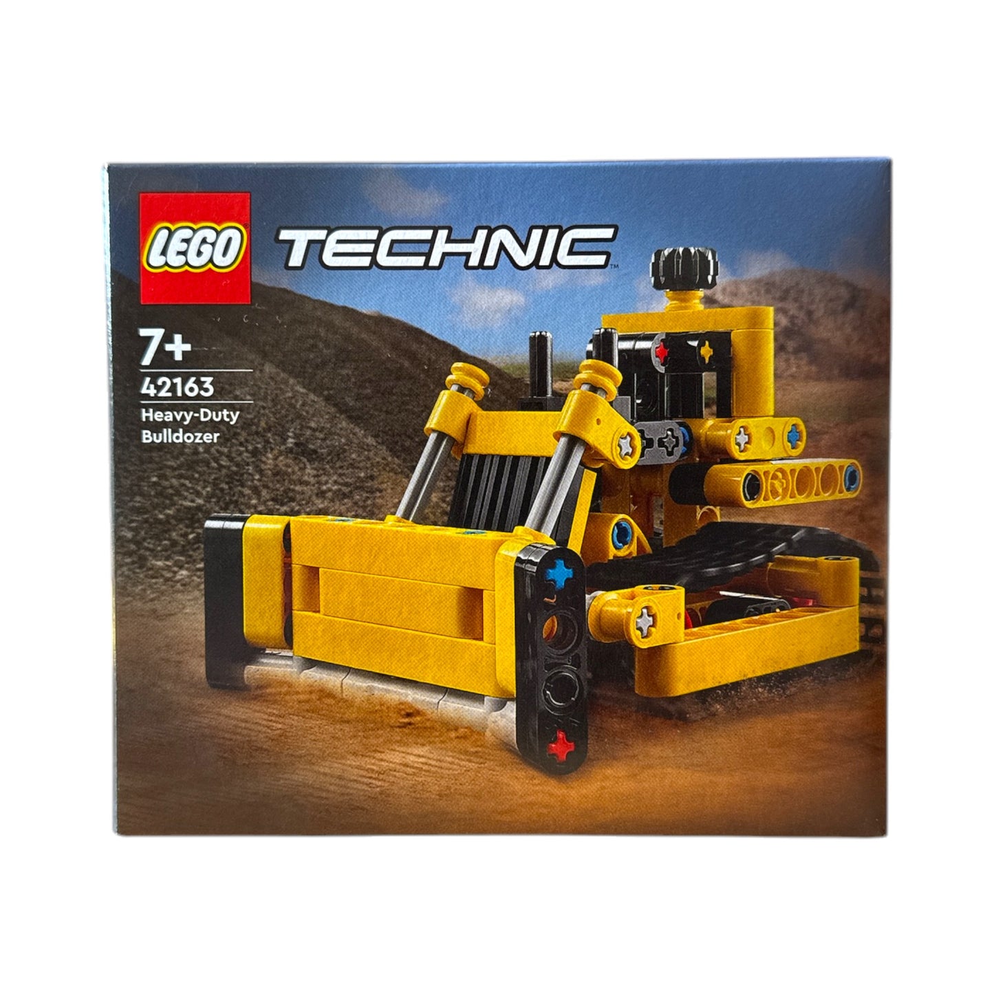 LEGO Technic Set 42163 Schwerlastbulldozer – Vorderseite der Verpackung mit gelbem Bulldozer-Modell